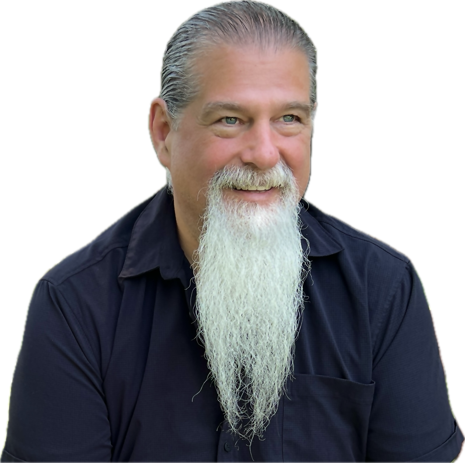 Vernon Hyndman, long white beard, smiling against a solid black background